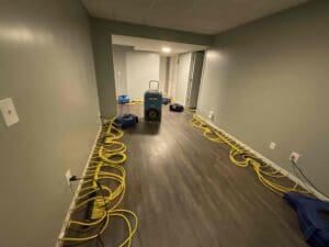 Drying-the-basement-after-homeowners-experienced-a-pipe-break